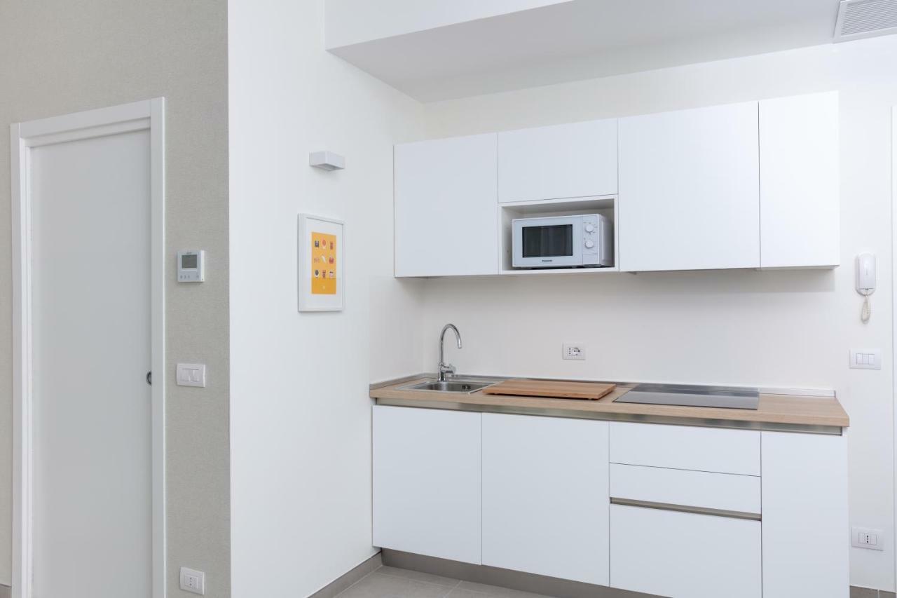 Cirene Apartments Milano Bagian luar foto